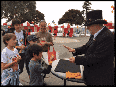Rich" Doc Magic" Freeman Performing at an outdoor fair